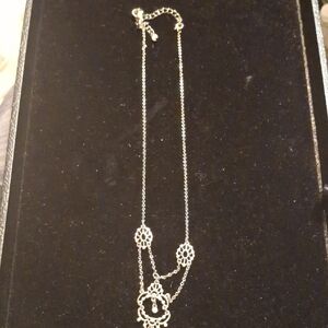 Elegant Silver Necklace with Floral Accents